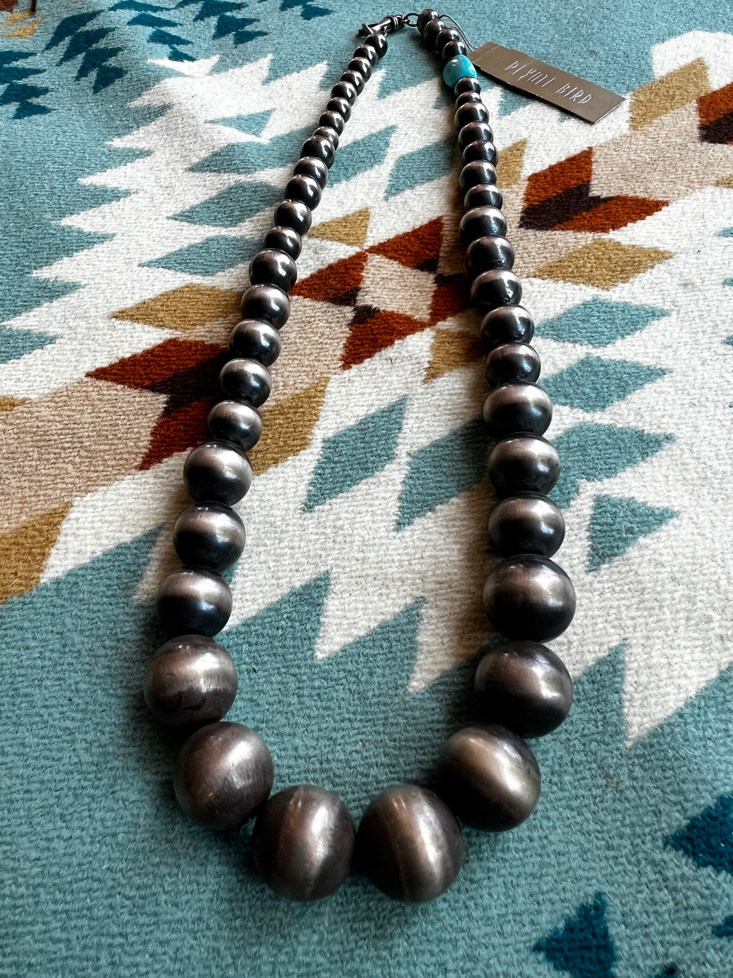 Graduated Navajo Pearls with single Turquoise stone